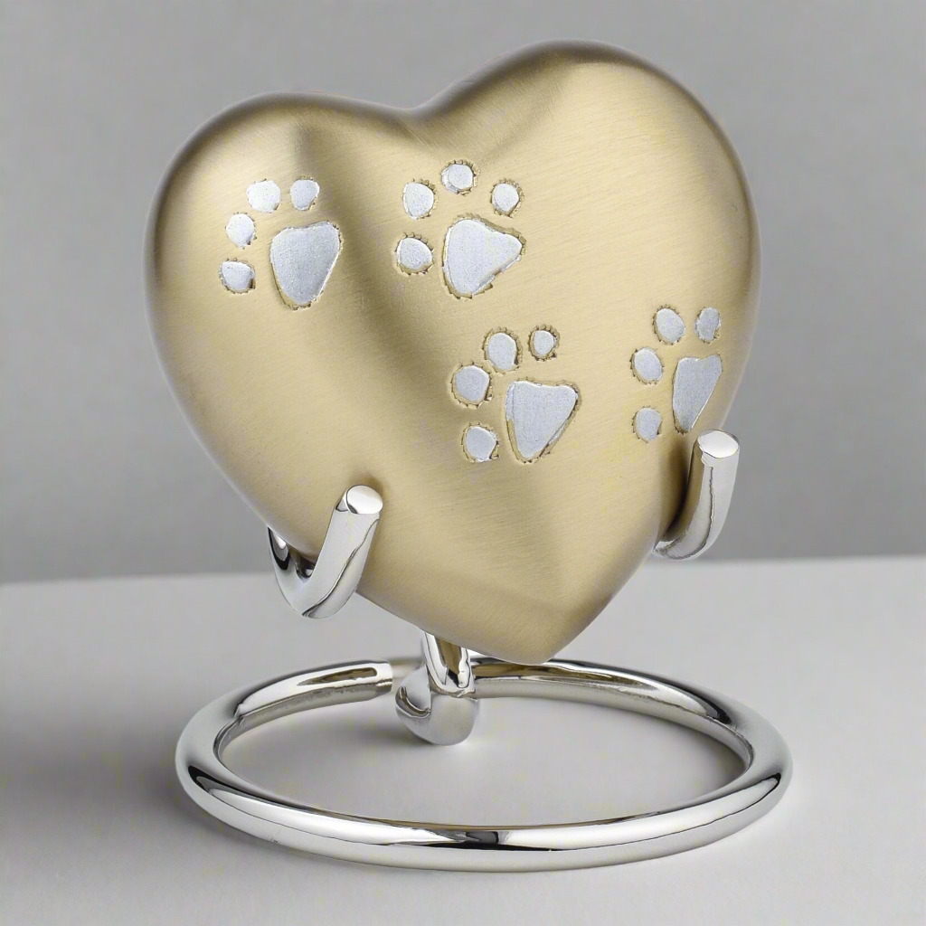 Royal Rapture Heart Urn in Black color with paw print for pet memorial.