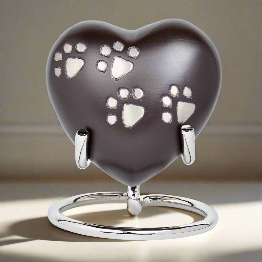 Royal Rapture Heart Urn in Red color with paw print for pet memorial.