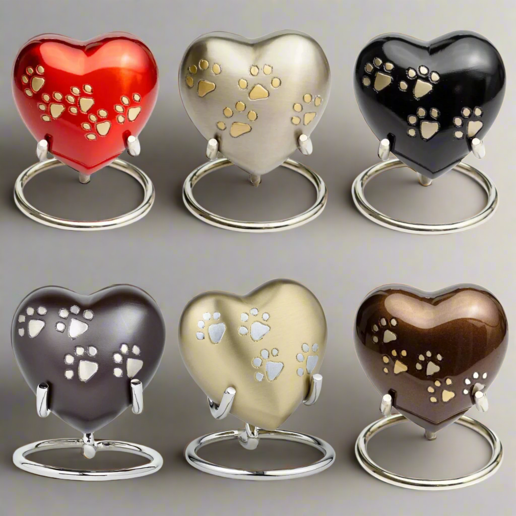 oyal Rapture Heart Urn in Pewter color with paw print for pet memorial.